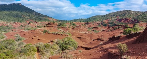 Unusual hike in the red earth of the canyon of the ruffes
