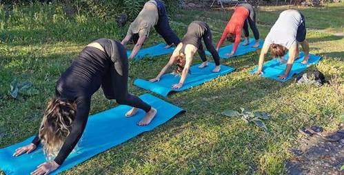 yoga postures in a guest house during a course in the Caroux